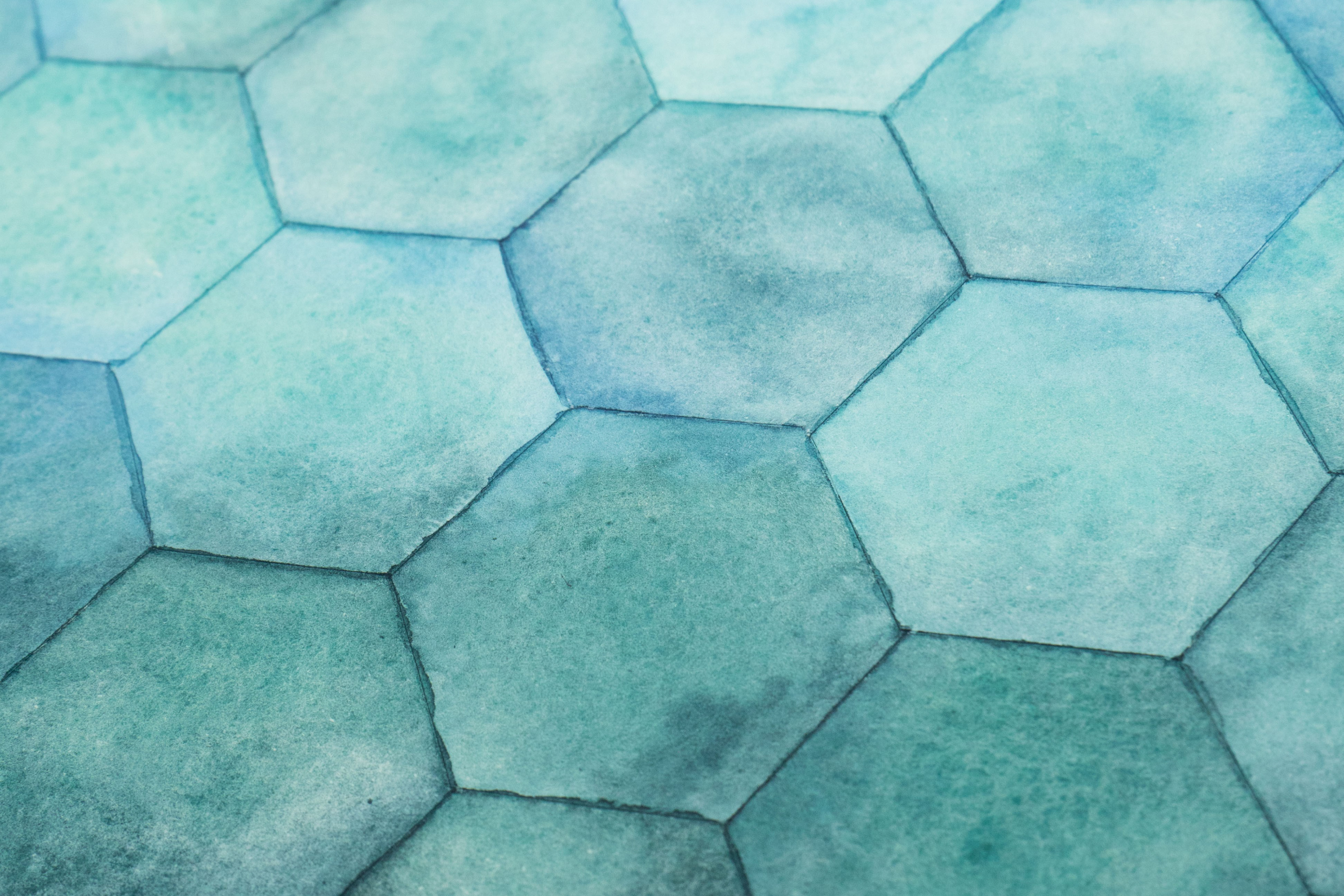 Close up of contemporary painting by Surrey, UK artist, Kerri Awosile - showing different tones of turquoise hexagons